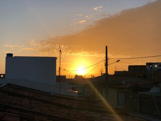 Naklejka na ściany i meble sunset over the city