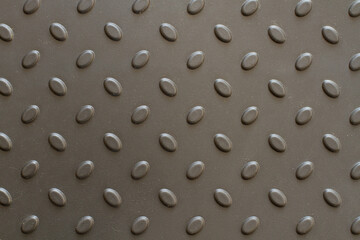 A background of bulging pimples. Plastic shoe tray. Background with gray raised details. Bulging oval elements