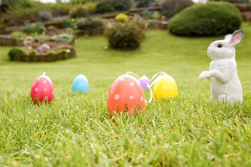 easter photography with eggs and rabbit in a garden