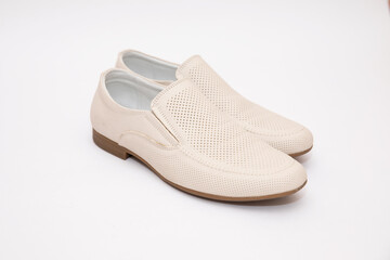 Mens white shoes on a white background