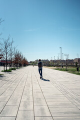 Man Riding Electric Scooter In City