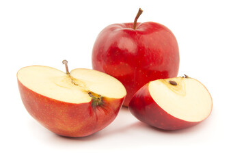 A whole and sliced red apple on a white background.