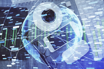 Double exposure of business theme hologram over desktop with phone. Top view. Mobile international trade connection concept.
