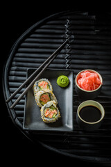 Sushi made of salmon and avocado. Traditional Japanese cuisine.