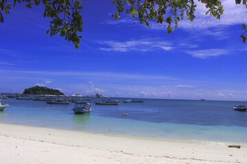 Ships leaning on the edge of a beautiful beach