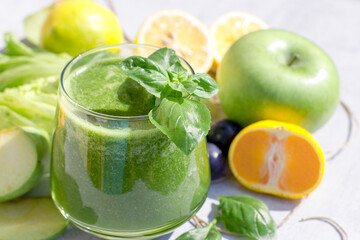 Green smoothie, healthy drink (beverage) made with fresh organic fruit and vegetable