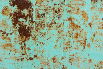 textured metal sheet with peeling blue, turquoise paint, metal corrosion