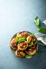 Homemade cheese swirls with pesto sauce