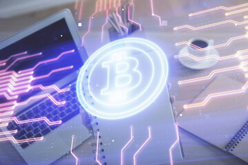 Double exposure of woman hands typing on computer and crypto market theme hologram drawing....
