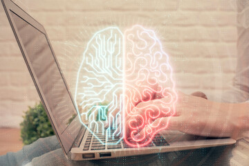 Multi exposure of woman hands working on computer and brain hologram drawing. Ai concept.