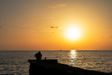 Naklejka na ściany i meble sunset at the sea