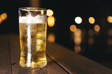 A glass of beer with a night of drinking