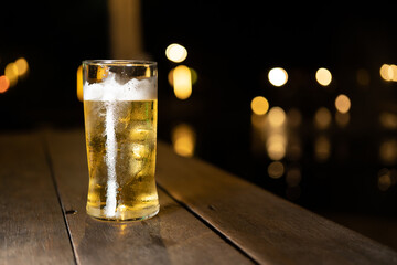 A glass of beer with a night of drinking