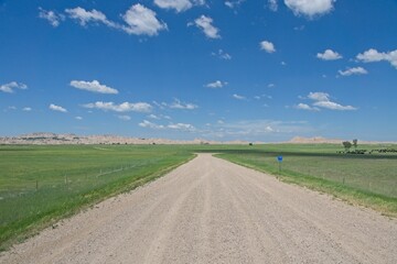 Fototapeta premium Interior USA - 25 June 2013 - Approaching Badlands National Park in South Dakota
