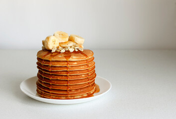 Pancakes with banana and nuts.