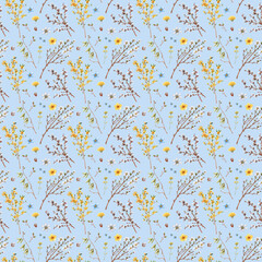Spring seamless floral pattern with blossom branches on the blue background with yellow and blue flowers.