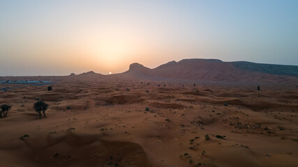 Fototapeta na wymiar Desert landscape during the sunset