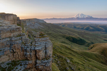 Fototapeta na wymiar Sunrise view of mount Elbrus from Bermamyt plateau. Karachay-Cherkessia, Caucasus, Russia.