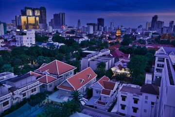 Naklejka premium View from a rooftop downtown at sunset (blue hour)