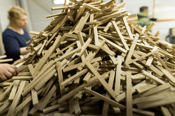 The close up of folded decorative untreated wood chips on table