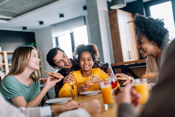 Multiethnic family dining together. Mixed race family concept