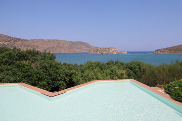 The island of Spinalonga seen from a beautiful pool, Crete, Greece