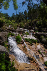 Fototapeta na wymiar Várzeas waterfall, in Gerês, during the spring