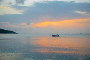 Fishing boat at sunset time.