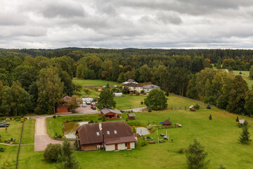 Fototapeta na wymiar Rural aerial view over the village houses. Estonia.