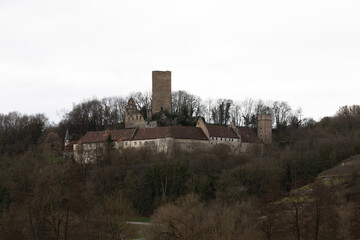 old castle complex, with defensive towers partially disintegrating in spring