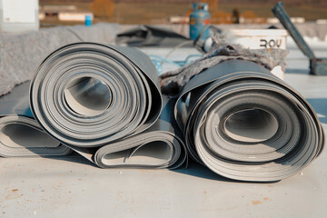 Roofing PVC membrane in rolls placed on the roof of the site