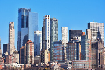 Fototapeta na wymiar Buildings architecture of Manhattan, New York City seen from Ellis Island, New Jersey, USA.