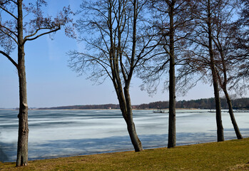 view of the dreamy waters of the side lake and the lake non-cin, from the village of Rydzewo near Giżycko in Masuria, Poland March 2021