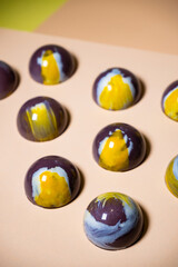 multicolored beautifully decorated handmade candies with fillings