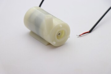 Mini submersible water pump which runs on dc power supply