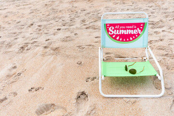 Beach chair in sand during summer holiday