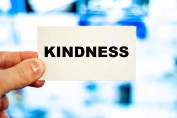 KINDNESS word in the hands of a doctor like medicine