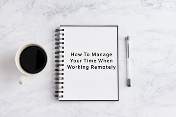 Notebook on desk written how to manage your time when working remotely