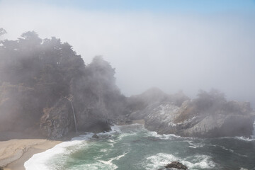 McWay Falls in morning fog ​in Big Sur, California