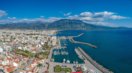 Obraz premium Idyllic landscape above Kalamata's Marina at sunset. Aerial photo of Kalamata city, Messenia, Peloponnese, Greece