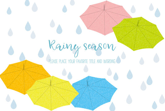 カラフルな傘と雨粒で表現した梅雨のイメージ背景素材