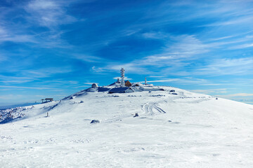 Empty ski chair lift on a mountain - season with no tourists.