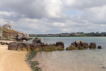 Fototapeta na wymiar Ruins of the Dolmen of Guinirvit, Bay of Kernic, Plouescat, Finistere, Brittany, France