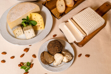 Homemade goat cheese and curd cheese served for breakfast. Organic dairy products. 
