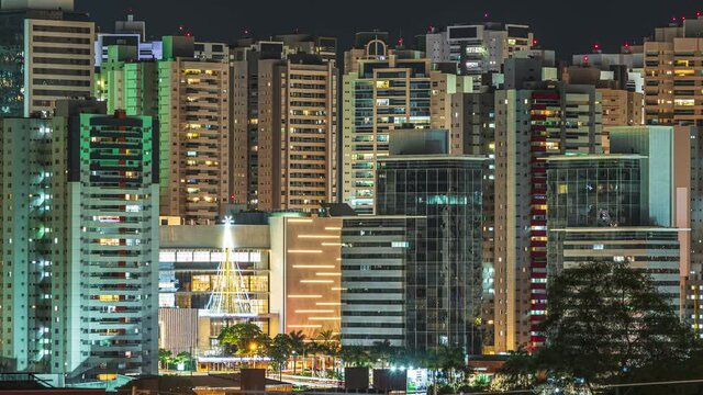 Time lapse of a big city with tall buildings at night, urban night life. Cityscape of Londrina city, PR, Brazil at Gleba Palhano neighborhood.