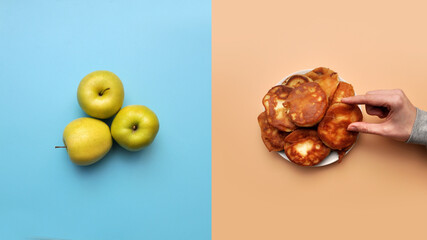 A plate of fried pancakes and green apples next to it. A person chooses between healthy and unhealthy food