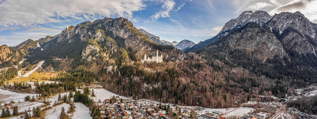 Aerial panorama drone shot of Hohenschwangau in Fussen with view of Neuschwanstein castle in...