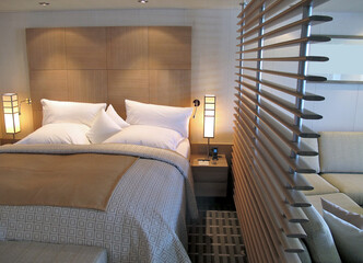 View into elegant clean modern design futuristic minimalistic ocean view suite with balcony,...