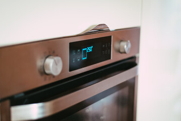 Obraz premium oven in the kitchen heated to a high temperature of 250 degrees Celsius - kitchen equipment