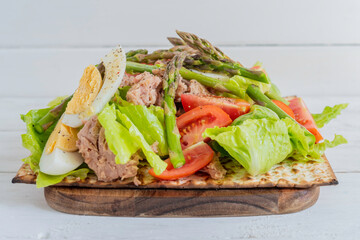 Tuna Salad on matzah bread. Food ideas for Jewish holiday Pesach.  